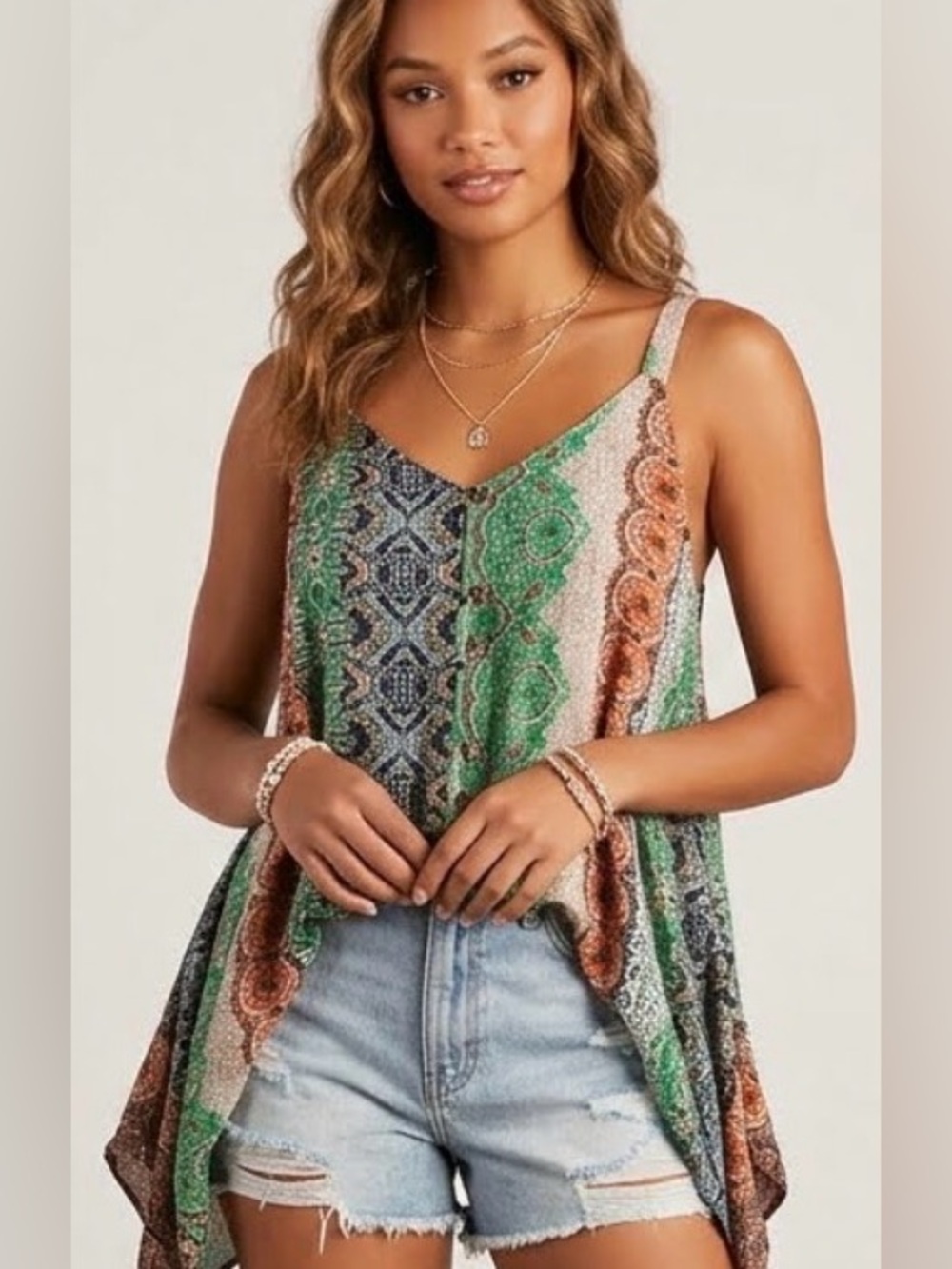 Multi colored handkerchief style sides flowing thin strap summer shirt